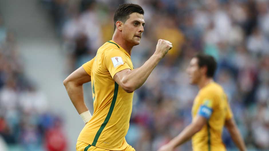 Juric celebrates giving Australia a lifeline back into the match.