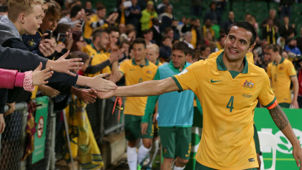 Tim Cahill thanks the fans after the Socceroos beat Bangladesh in Perth in September.