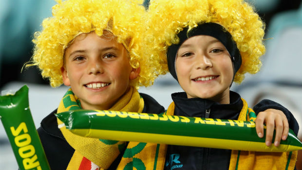 Two young fans show their support for the Caltex Socceroos.