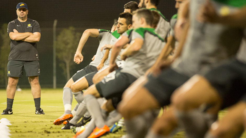 Caltex Socceroos coach Ange Postecoglou puts his squad through a training session.