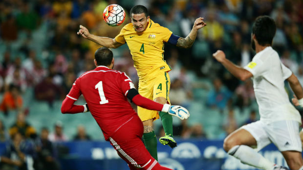 Striker Tim Cahill heads home the Socceroos' third goal against Jordan before half-time.