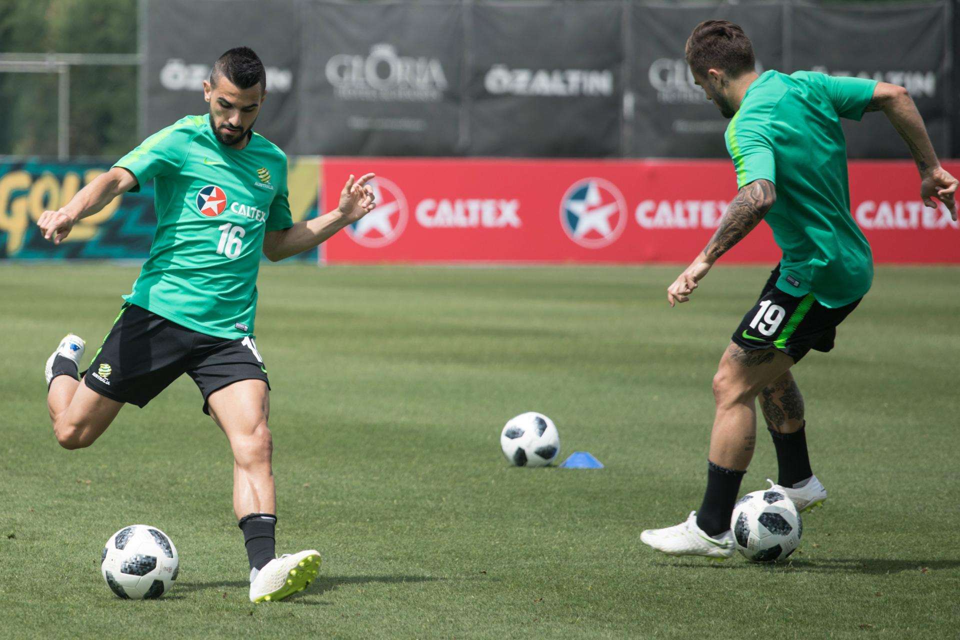 Aziz Behich looks to get a pass away.