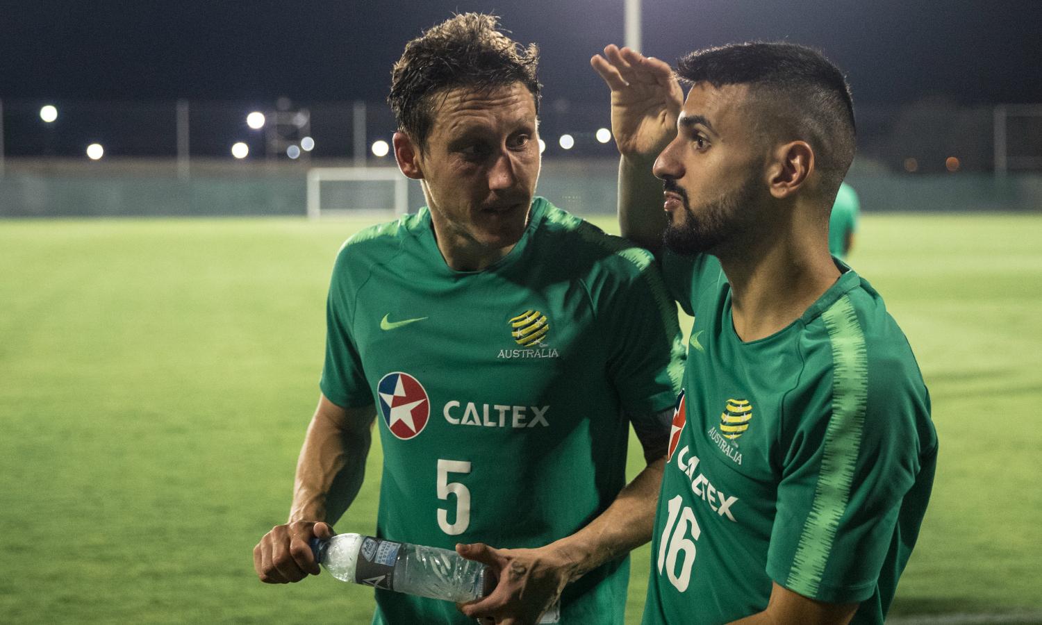Mark Milligan and Aziz Behich