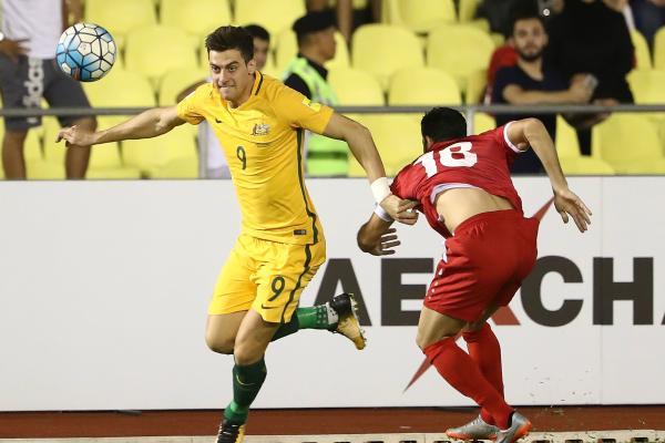 Tomi Juric breaks free of his Syrian defender in the first leg.