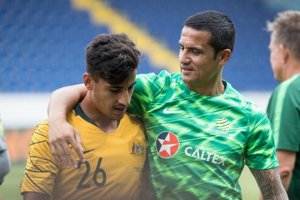 Tim Cahill with Daniel Arzani