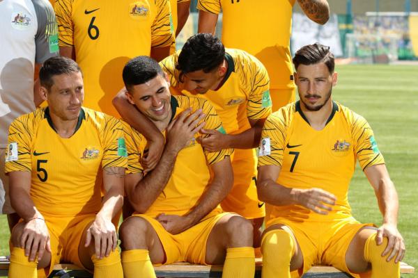 Daniel Arzani and Tom Rogic have some fun during the official team photo