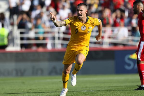 Jamie Maclaren celebrates his goal.