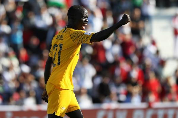 Awer Mabil celebrates his goal.