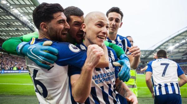 Mat Ryan, Aaron Mooy celebrate Brighton goal