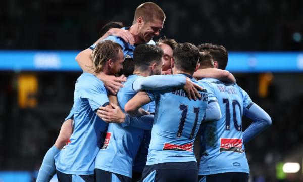 Sydney FC celebrate after Adam Le Fondre hustles the Sky Blues into a two-goal lead