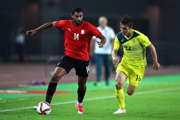 Joel King chases down an Egyptian opponent at the Tokyo 2021 Olympics