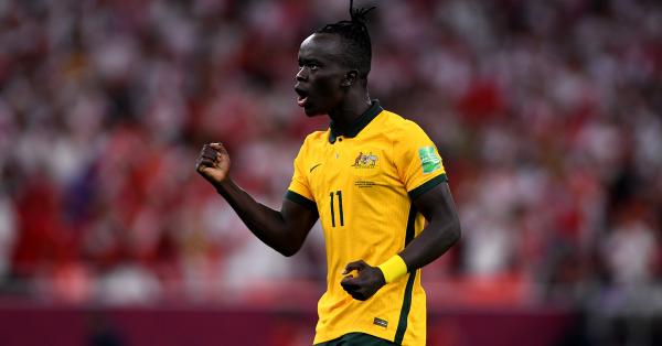 Awer Mabil celebrates scoring in the Socceroos World Cup Playoff penalty shootout