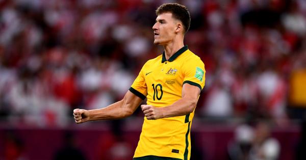 Ajdin Hrustic celebrates after scoring in the Socceroos penalty shootout win over Peru