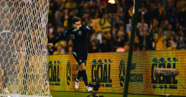 Craig Goodwin celebrates after scoring against Lebanon at GIO Stadium