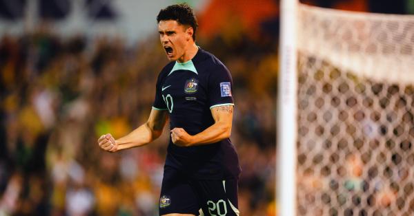 John Iredale celebrates scoring his first Socceroos goal