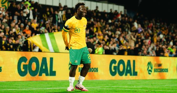 Nestory Irankunda celebrates after scoring his first Socceroos goal against Palestine