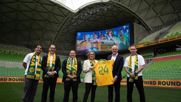 Subway Socceroos head coach Graham Arnold, new assistant coach Luke Wilkshire, cap #596 Daniel Arzani, Football Australia CEO James Johnson, Premier of Victoria Jacinta Allan and Minister for Tourism, Sport and Major Events Steve Dimopoulos.