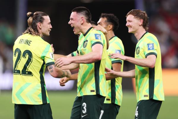 SYDNEY, AUSTRALIA - MARCH 20: Lewis Miller of Australia celebrates with team mates after scoring a goal during the round three FIFA 2026 World Cup AFC Asian Qualifier match between Australia Socceroos and Indonesia at Allianz Stadium on March 20, 2025 in Sydney, Australia. (Photo by Matt King/Getty Images)