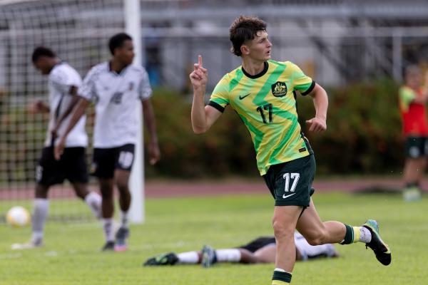 Joey Sikora celebrates scoring against Fiji