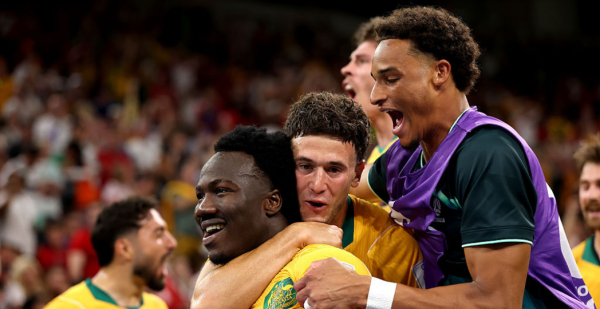 VANCOUVER, BRITISH COLUMBIA - JUNE 13: Nestory Irankunda #17 of Australia celebrates scoring his team's first goal with teammates during the FIFA World Cup 2026 Group D match between Australia and Türkiye at BC Place Vancouver on June 13, 2026 in Vancouver, British Columbia. (Photo by Stu Forster/Getty Images)