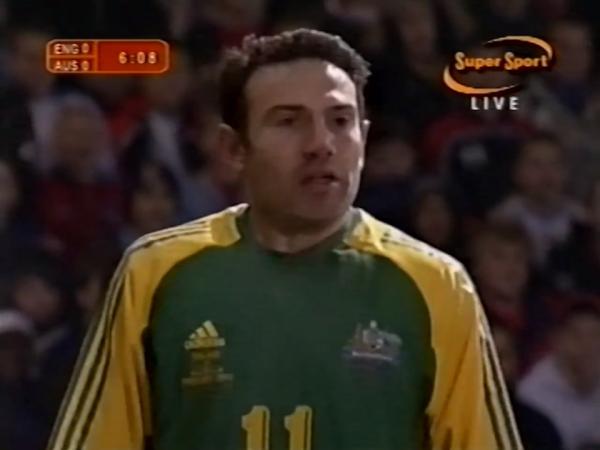 Stan Lazaridis dashes down the wing against England