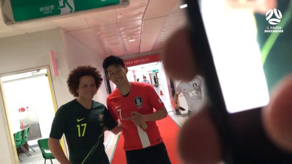 Amini and Son exchange jerseys