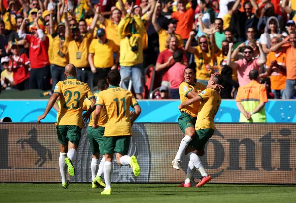 Cahill celebrating his famous goal against the Netherlands at the 2014 FIFA World Cup
