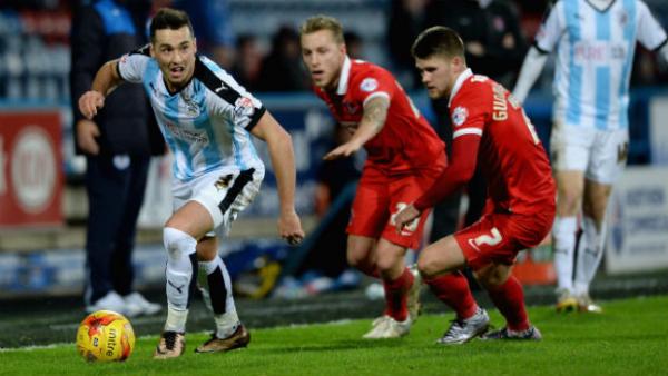 Jason Davidson goes on a run for Huddersfield Town against Charlton in the Championship.