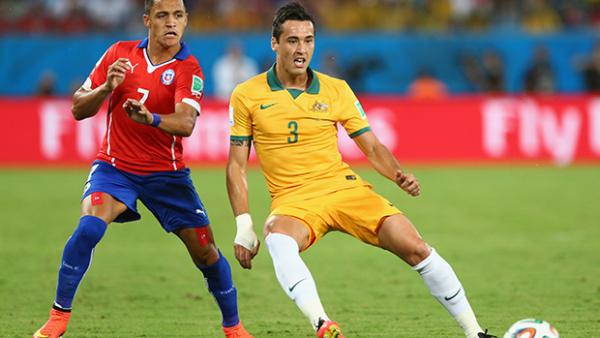 Davidson battles for the ball against Chile's Alexis Sanchez.