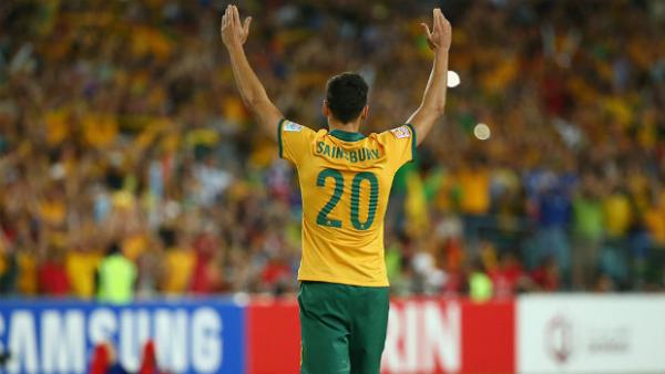 Trent Sainsbury celebrates after the Socceroos win the AFC Asian Cup final.
