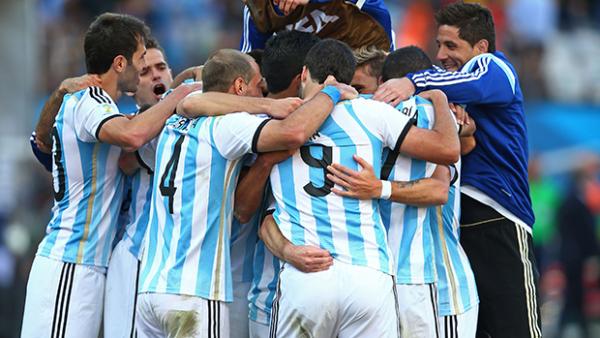Argentinian players celebrate after Di Maria broke the deadlock.