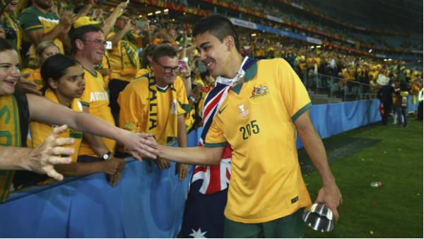 Socceroos midfielder Massimo Luongo thanks members of the crowd after Australia's AFC Asian Cup triumph.