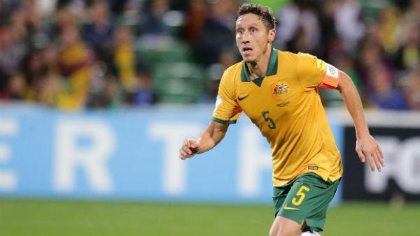 Mark Milligan on the ball at nib Stadium against Bangladesh.