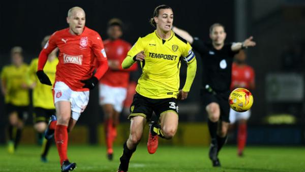 Aaron Mooy pursues Jackson Irvine during their respective side's clash in the Championship on Tuesday night.