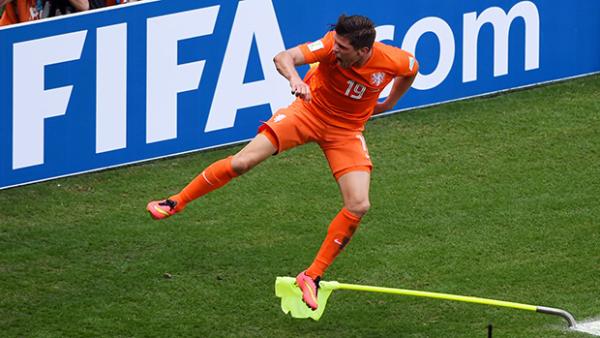 Dutch striker Klaas-Jan Huntelaar celebrates converting his stoppage time penalty against Mexico.