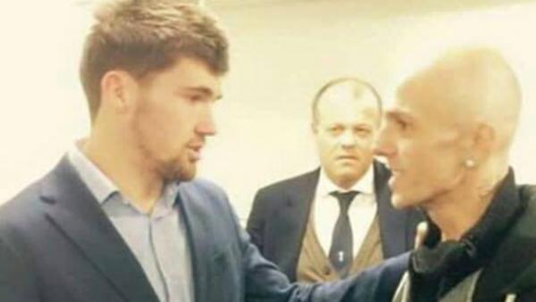 Club Brugge goalkeeper Mat Ryan and fan  Lorenzo Schoonbaert.