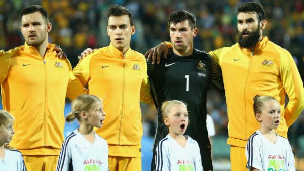 The Caltex Socceroos sing the national anthem ahead of kick-off in their World Cup qualifier against Tajikistan.