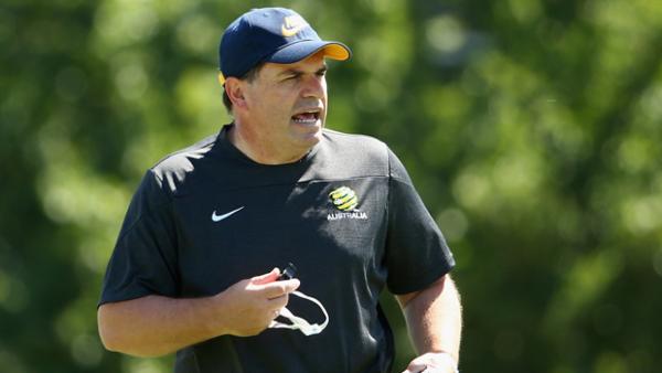 Ange Postecoglou gives his side instructions during today's Socceroos training session.
