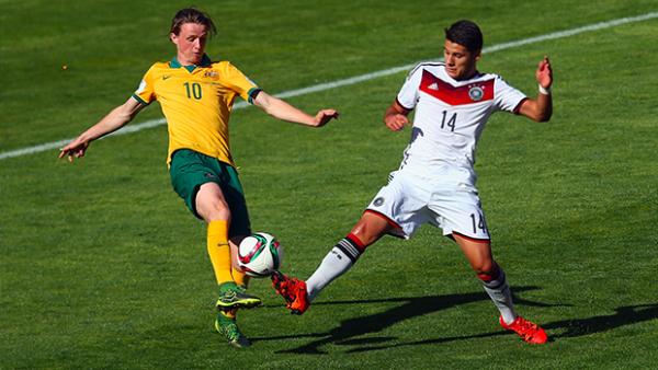 Josh Hope has a shot at goal against Germany