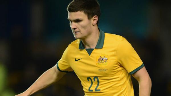 Caltex Socceroo Curtis Good on the ball against Ecuador in 2014.