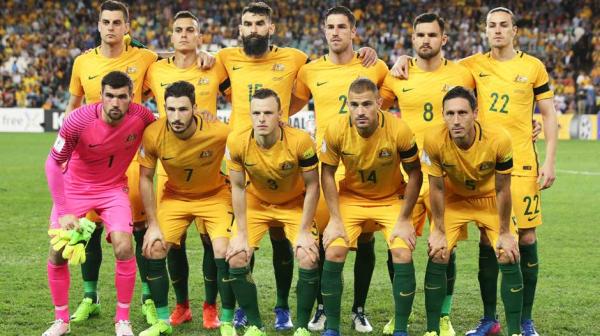 The Caltex Socceroos starting XI take their team shot just before kick off.