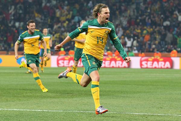 Holman quits Socceroos