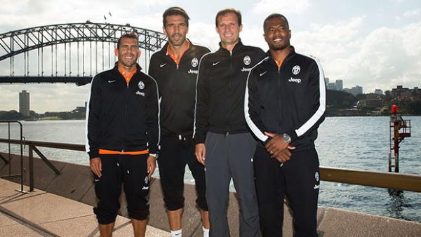 Carlos Tevez, Gianluigi Buffon, Coach Massimiliano Allegri and Patrice Evra of Juventus pose in front of the Sydney Harbour Bridge.