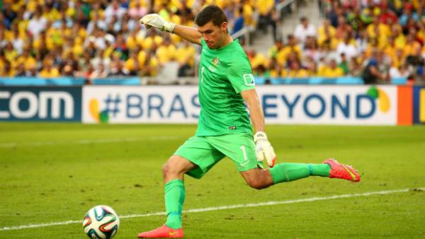 Socceroos goalkeeper Mat Ryan clears the ball against Spain at the World Cup.