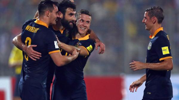 Mile Jedinak celebrates after scoring in Australia's 4-0 win over Bangladesh.