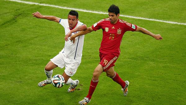 Costa in action for Spain against Chile at the World Cup in Brazil.