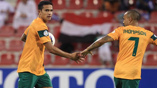 Tim Cahill celebrates with Archie Thompson after scoring against Iraq in October 2012.