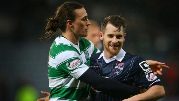 Ross County's Jackson Irvine celebrates with teammate Jonathan Franks after their side's win over Celtic in the Scottish League Cup semi-finals.