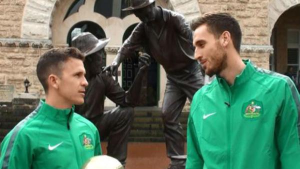 Socceroos Matt McKay and Matthew Spiranovic outside The Perth Mint.