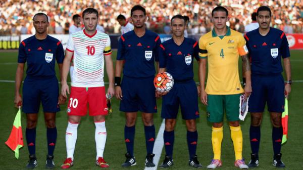 The captains and match officials before the Socceroos and Tajikistan kicked-off in Dushanbe.